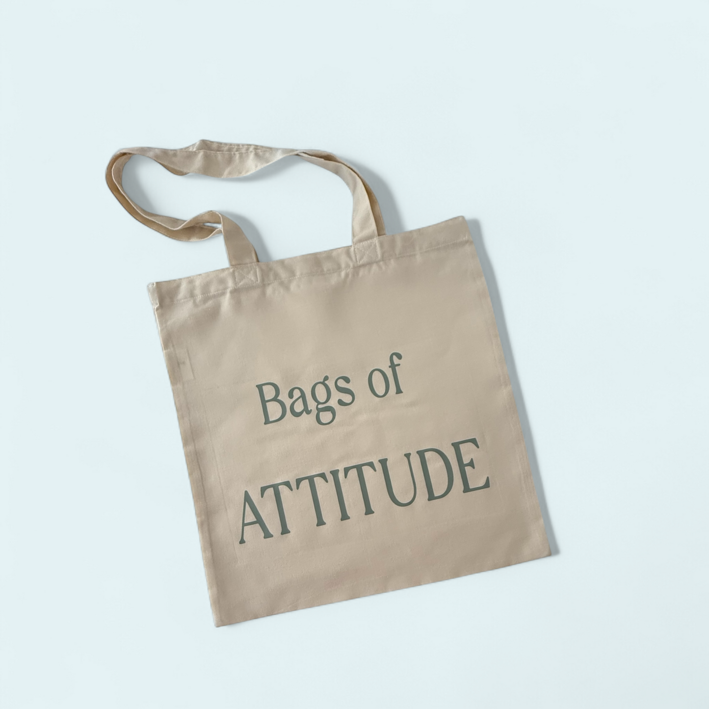 Bags of Attitude Tote with sage green lettering and stylish design for carrying essentials