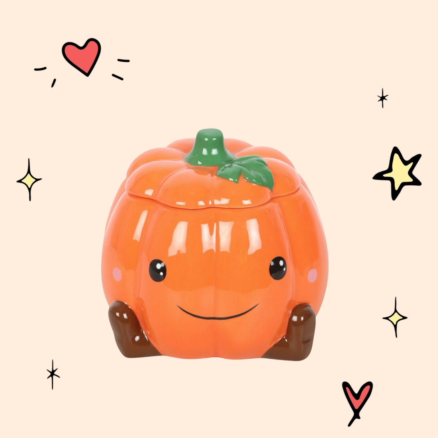 Playful Pumpkin Wax Melter ceramic burner with smiling pumpkin face and star cut-outs glowing warmly