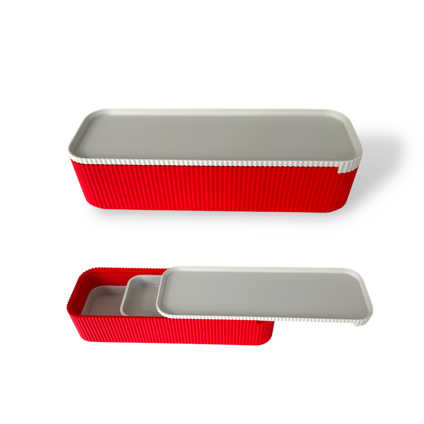 Red pencil case with sliding lid and internal tray for secure storage