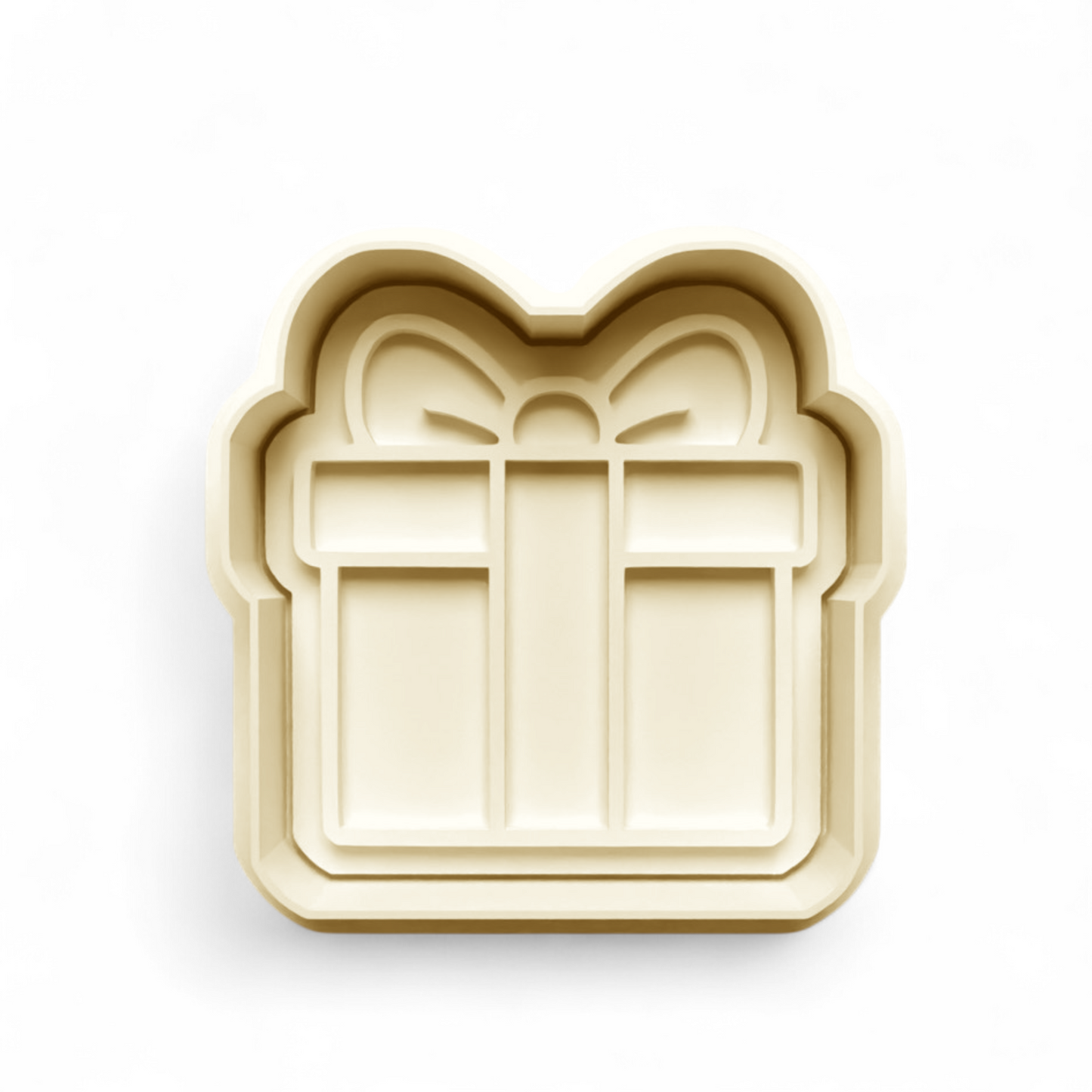 Gift-shaped cookie and fondant cutter for festive baking and detailed imprinting