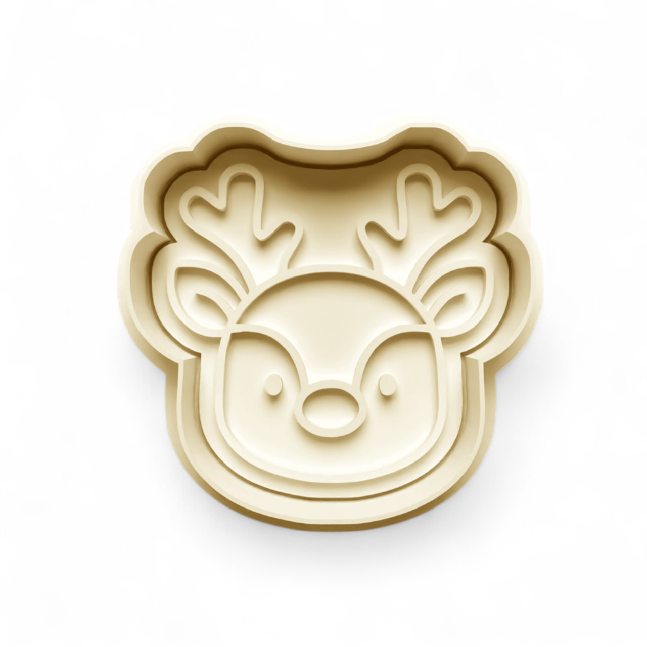 Reindeer Cookie/Fondant Cutter shaping festive reindeer cookies with detailed features