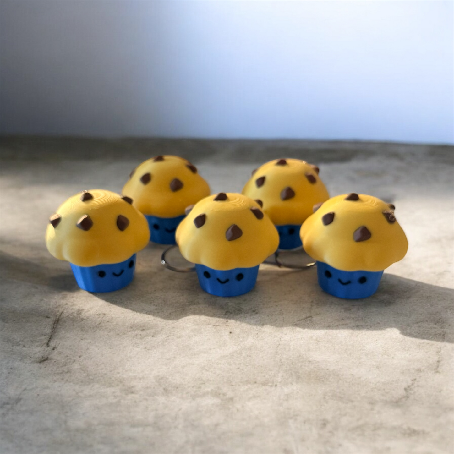 MUFFIN FACE CLICKER YELLOW