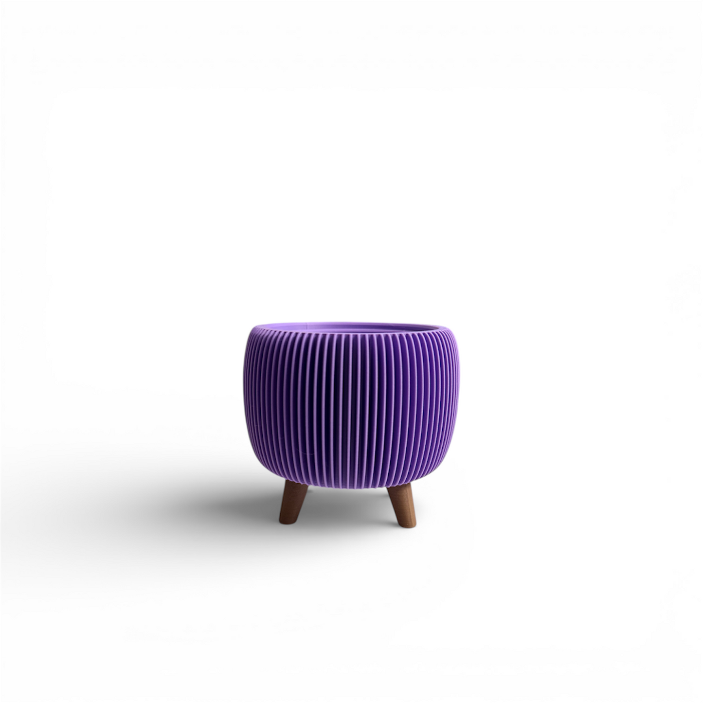 Retro Ribbed Mini Planter in lavender with ribbed texture and raised feet, featuring a liner insert for drainage and vintage style.