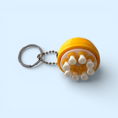 GOLFING TEE LEMON CLICKER KEYCHAIN