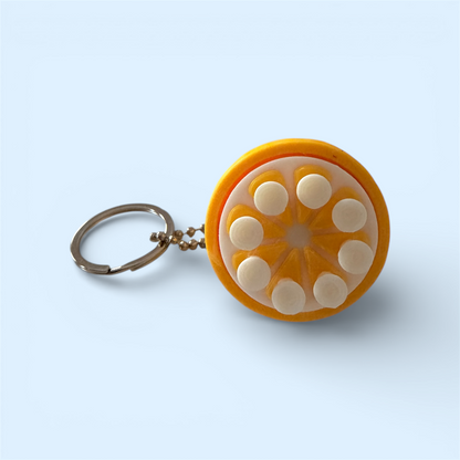 GOLFING TEE LEMON CLICKER KEYCHAIN
