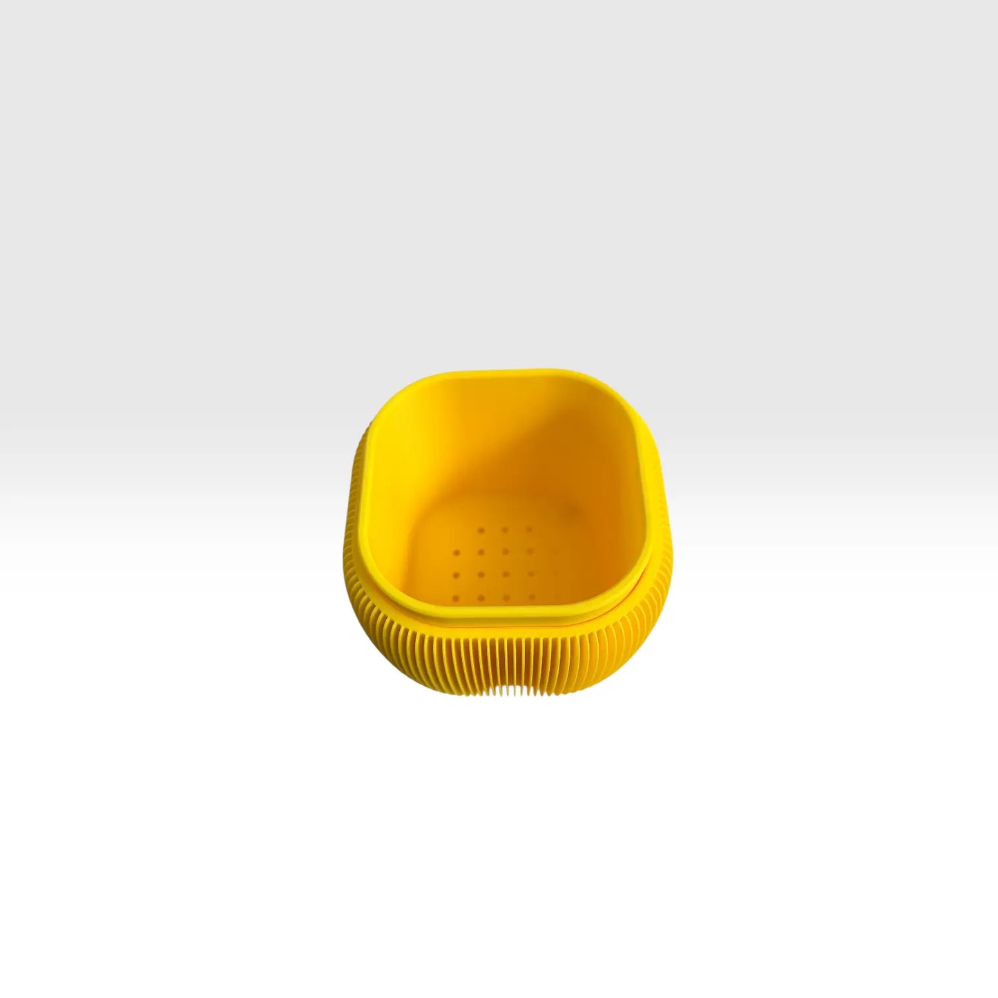 Bright yellow retro rounded square planter with ribbed texture and drainage liner for indoor plants
