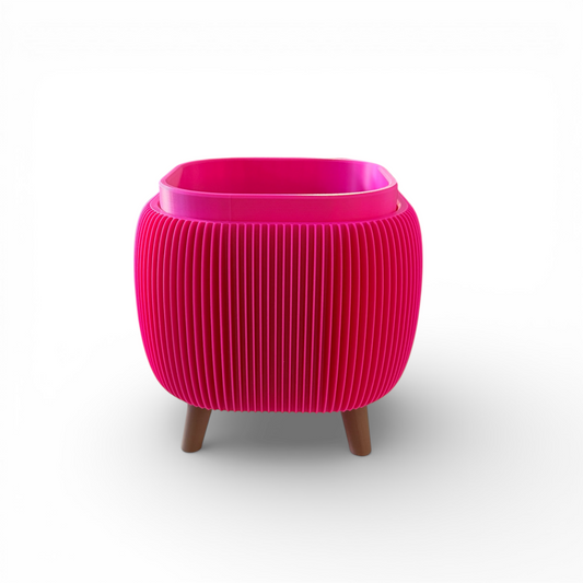 Retro Rounded Square Planter in raspberry with ribbed texture and raised feet for indoor plants