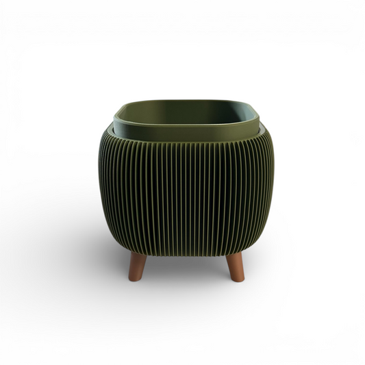 Retro Rounded Square Planter in olive matte with ribbed texture and raised feet, perfect for indoor herbs and small plants.