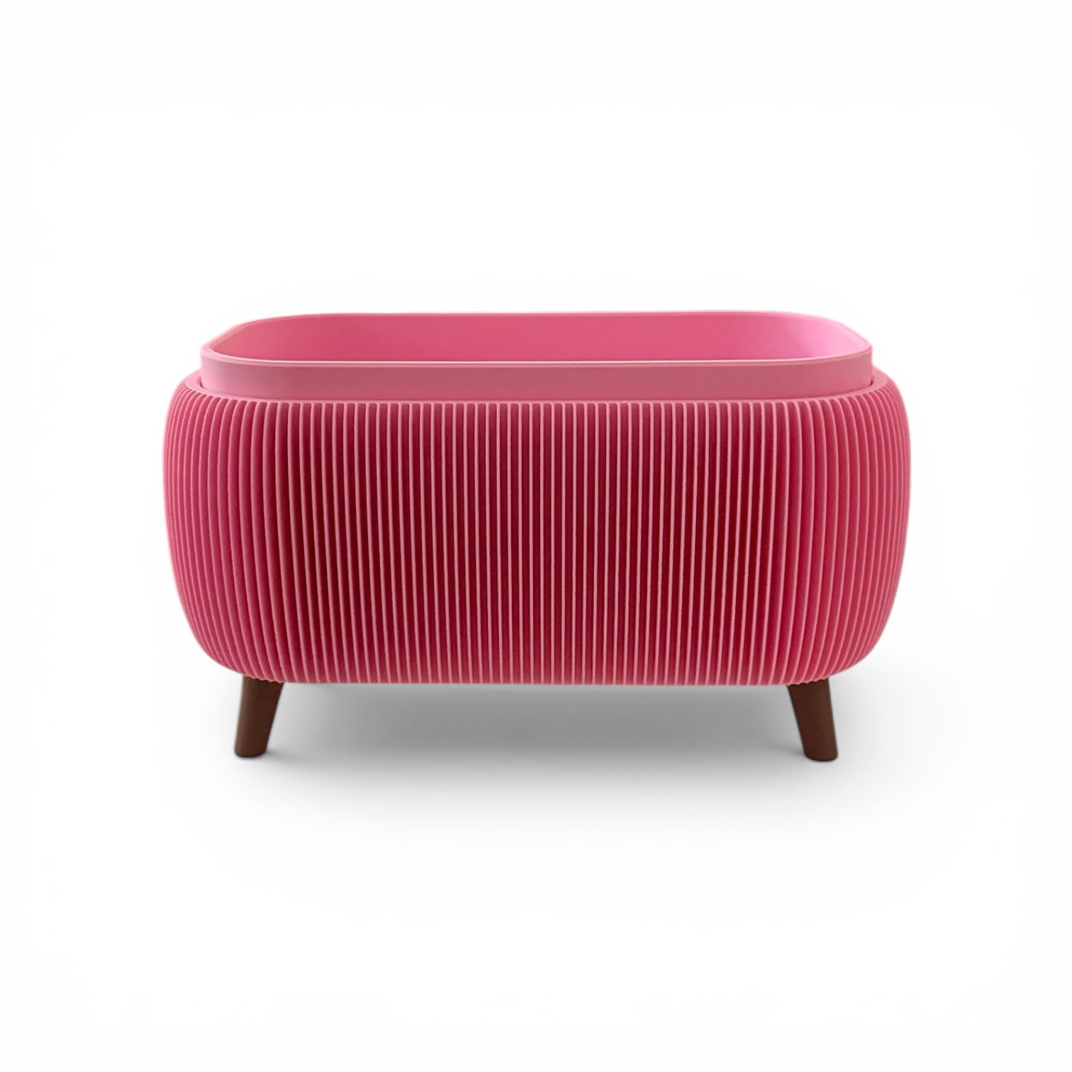 Soft pink retro rounded oblong planter with ribbed texture and drainage liner insert for indoor herbs and small plants