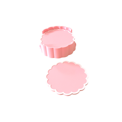 Pink scalloped coaster set with matching holder