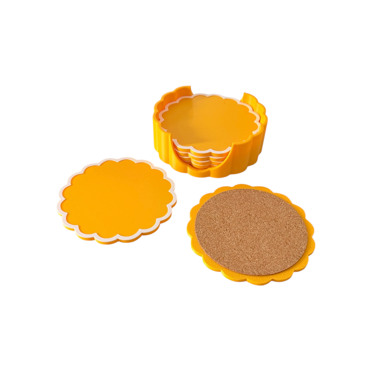 A set of scalloped circular coasters in bright yellow, shown with one stack, one coaster removed, and one coaster displaying a cork insert. Photographed on a clean white background.